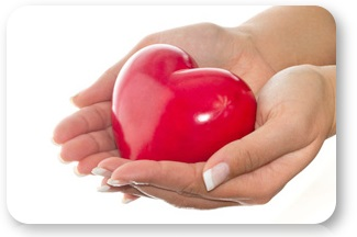 Heart in the hands of a woman.